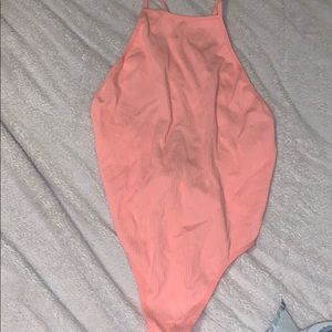 Pink body suit